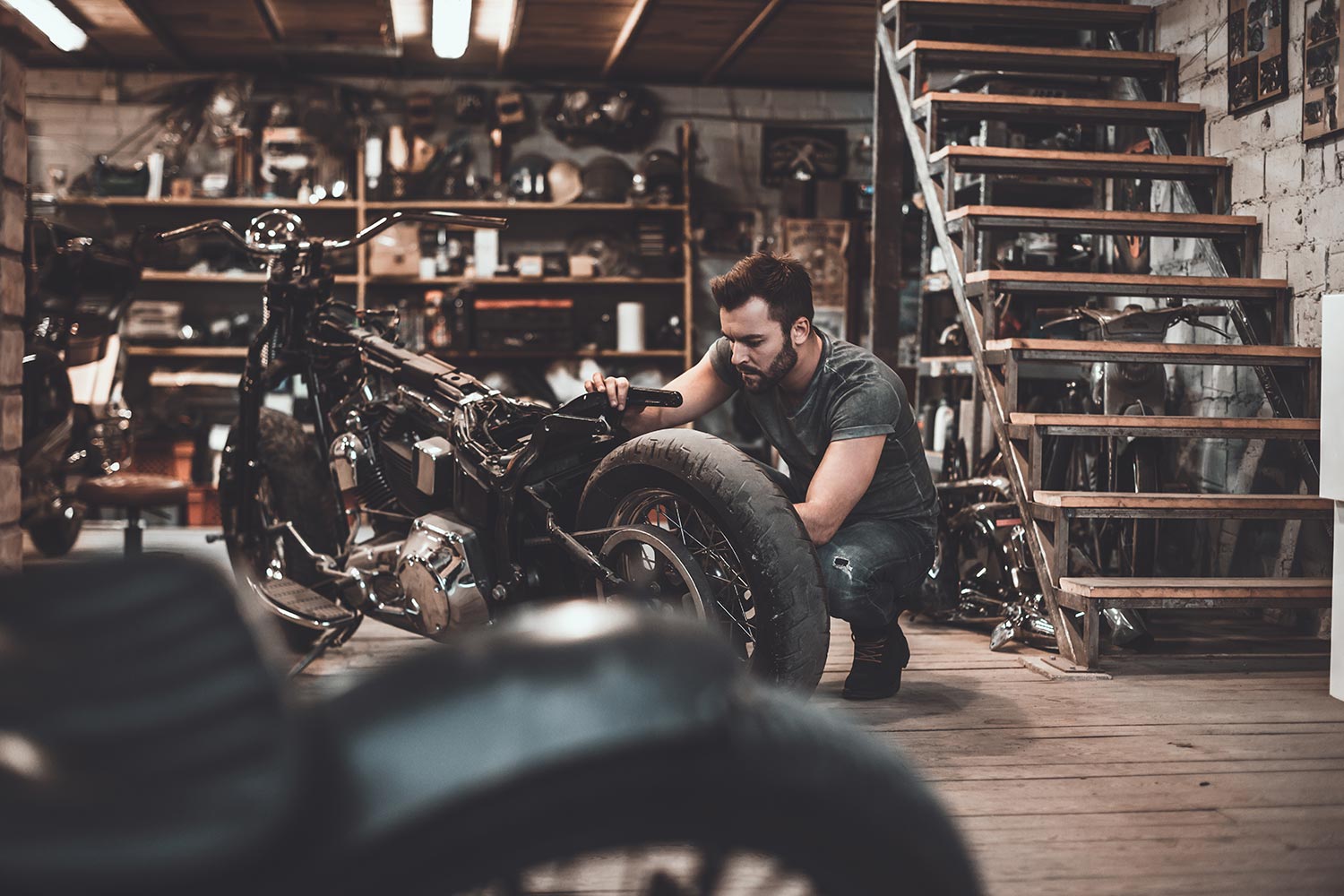 man-repairing-bike-confident-young-man-repairing-m-K9ZPERL-resize.jpg